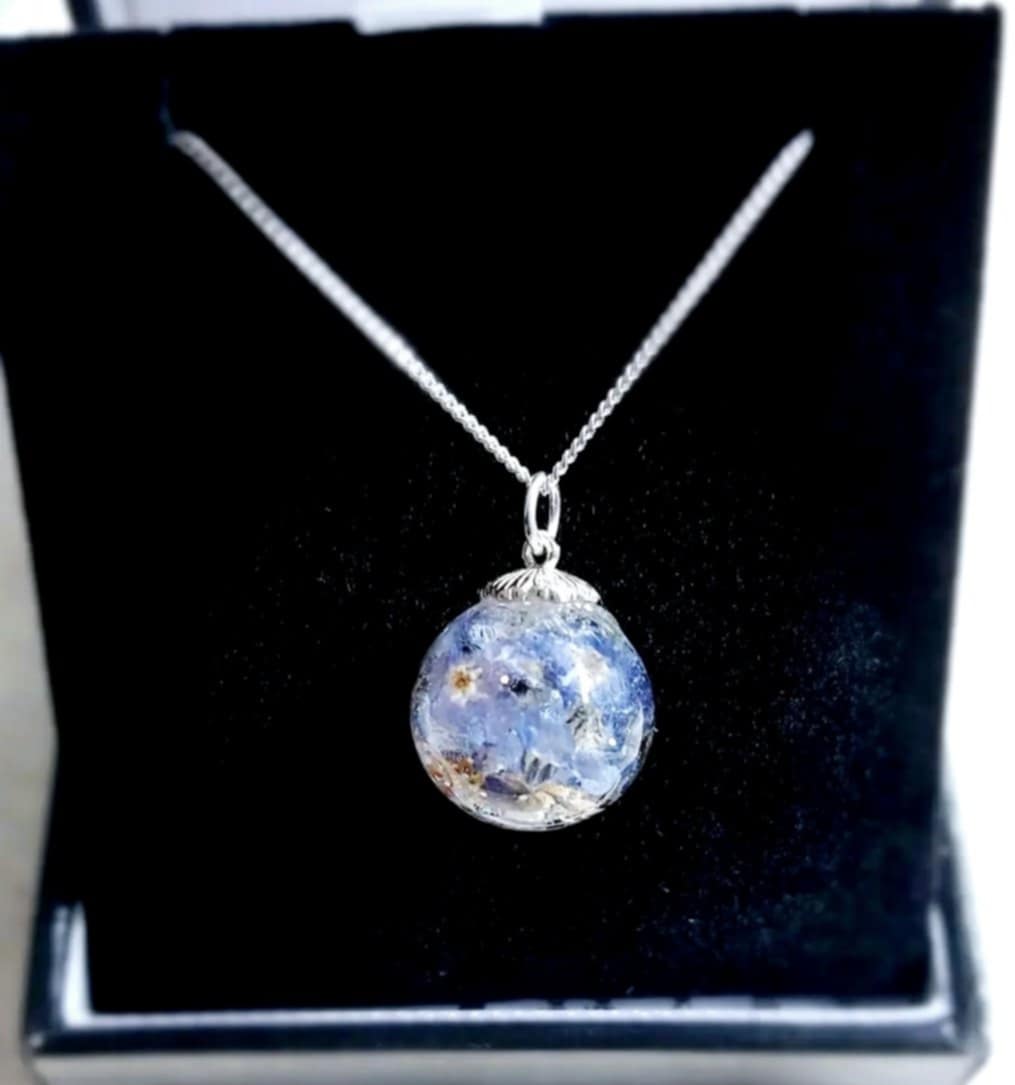 Ashes and Forget Me Nots Glass Memorial Pendant with silver cap and chain